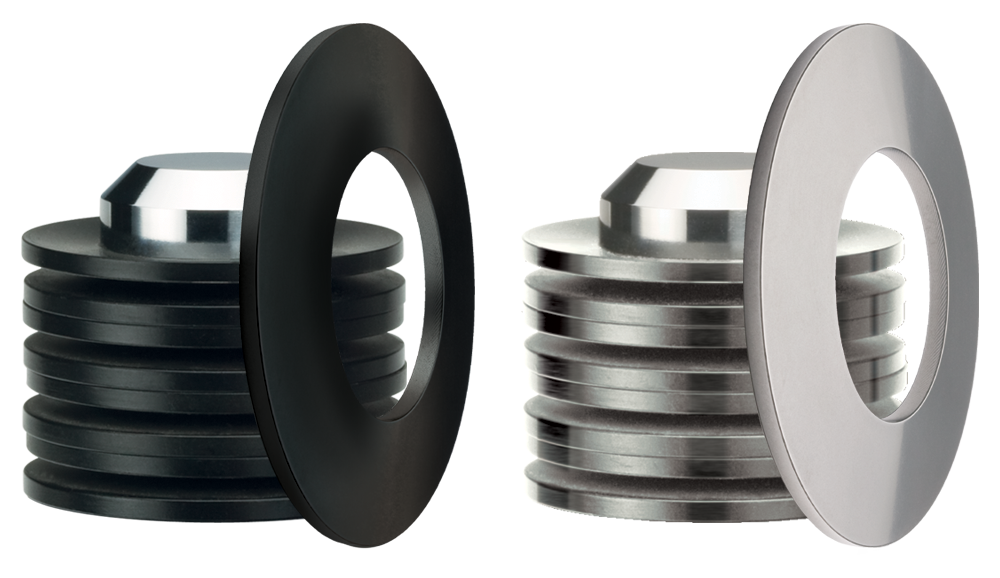 Figure 1: Disc Springs are available in different types of materials. In this picture, Disc Springs are shown in carbon steel (left), and 17-7 stainless steel (right).